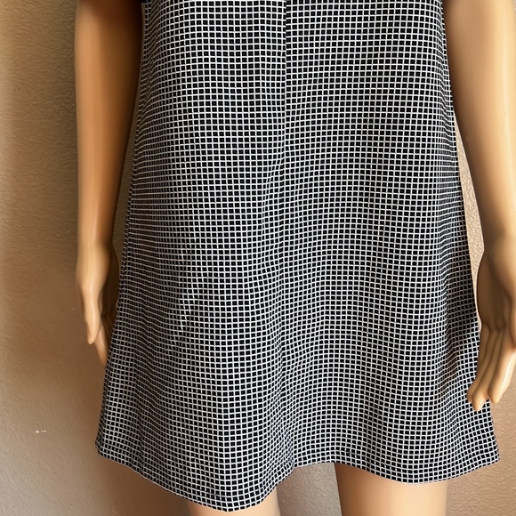 BCBGENERATION Black & White Checkered
Sheath Dress with Sheer V Neck Size XS - Picture 11 of 12
